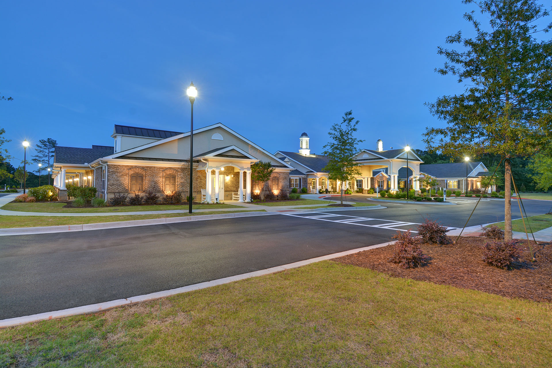 Benton House-Woodstock-GA-exterior-night-wide 55 And Over Community in Woodstock