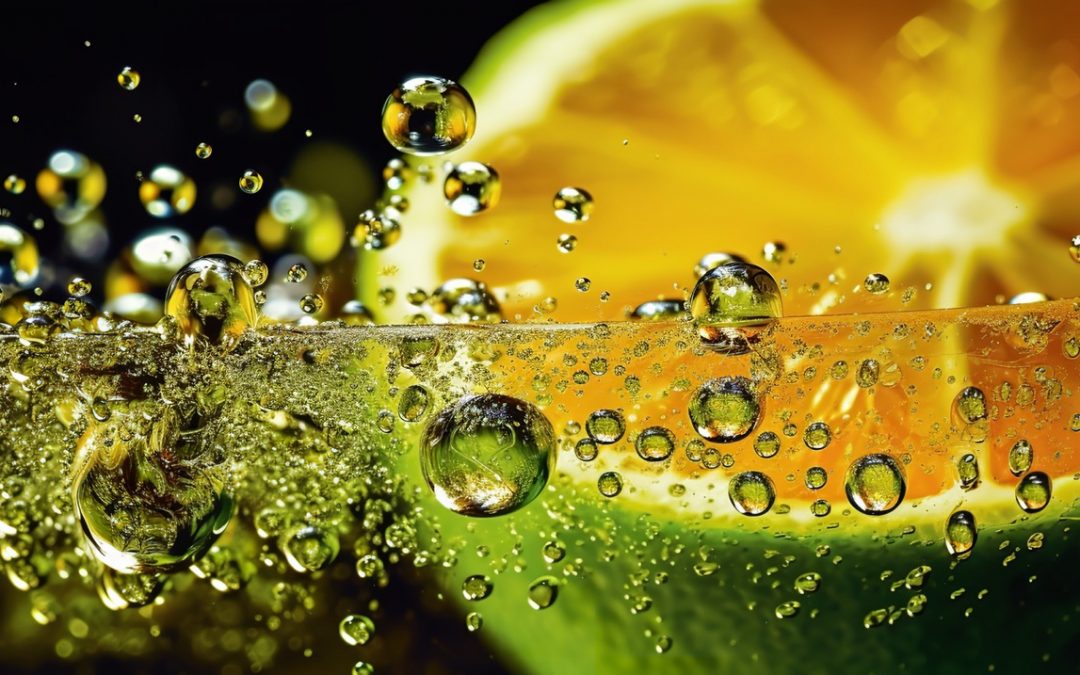 Fresh citrus in water with bubbles