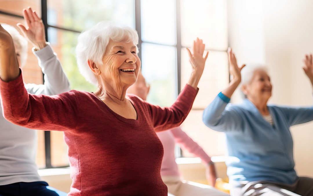 senior women with arms up exercising